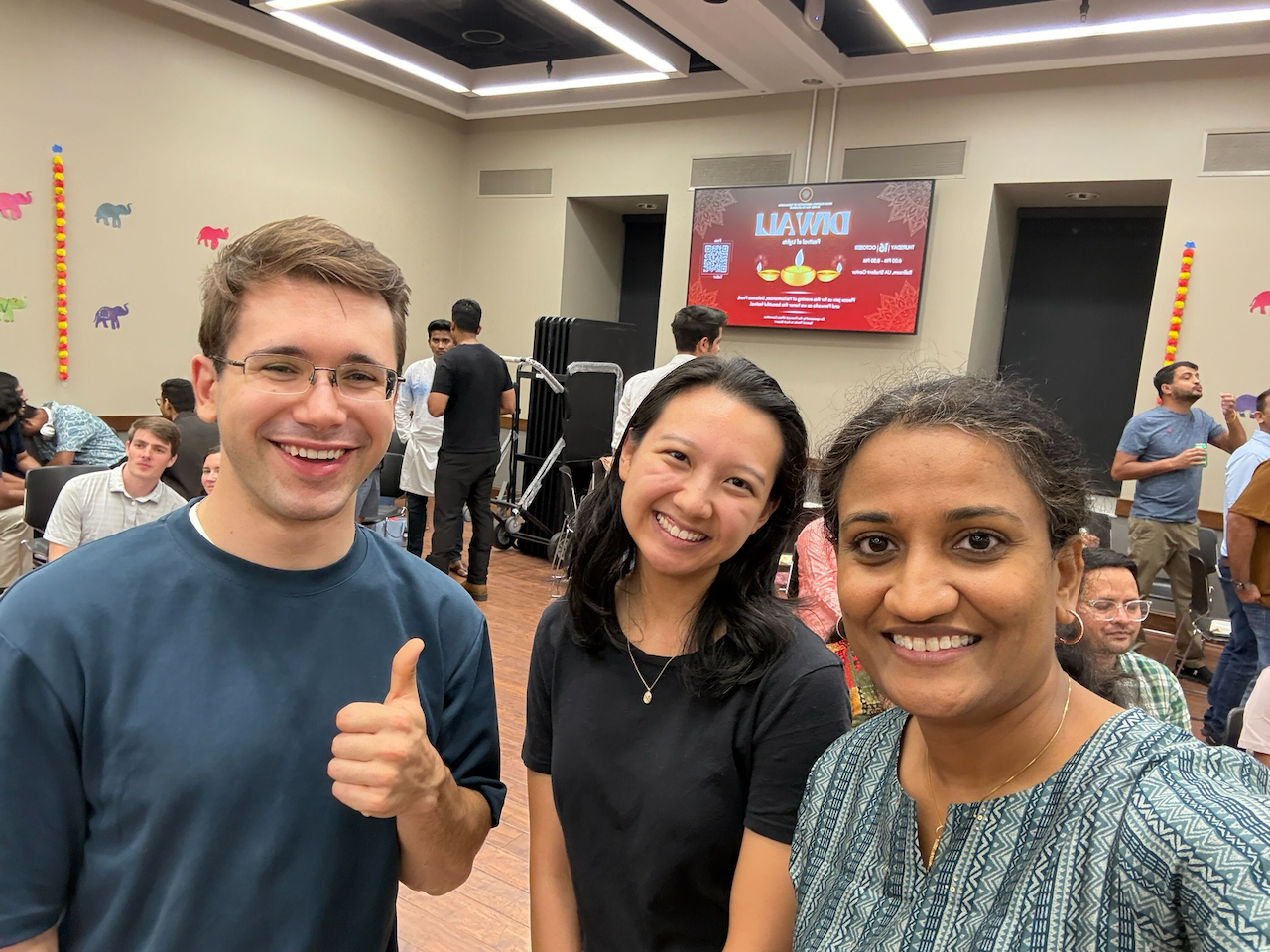 Leo Lonzarich, Quinn Lee, and Arpita Patel at University of Alabama's Diwali event